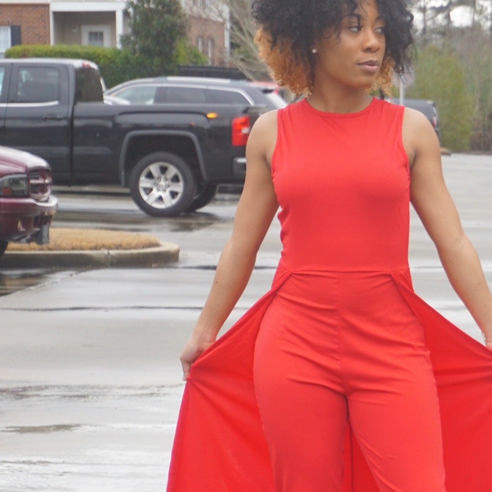 Red jumpsuit with cape